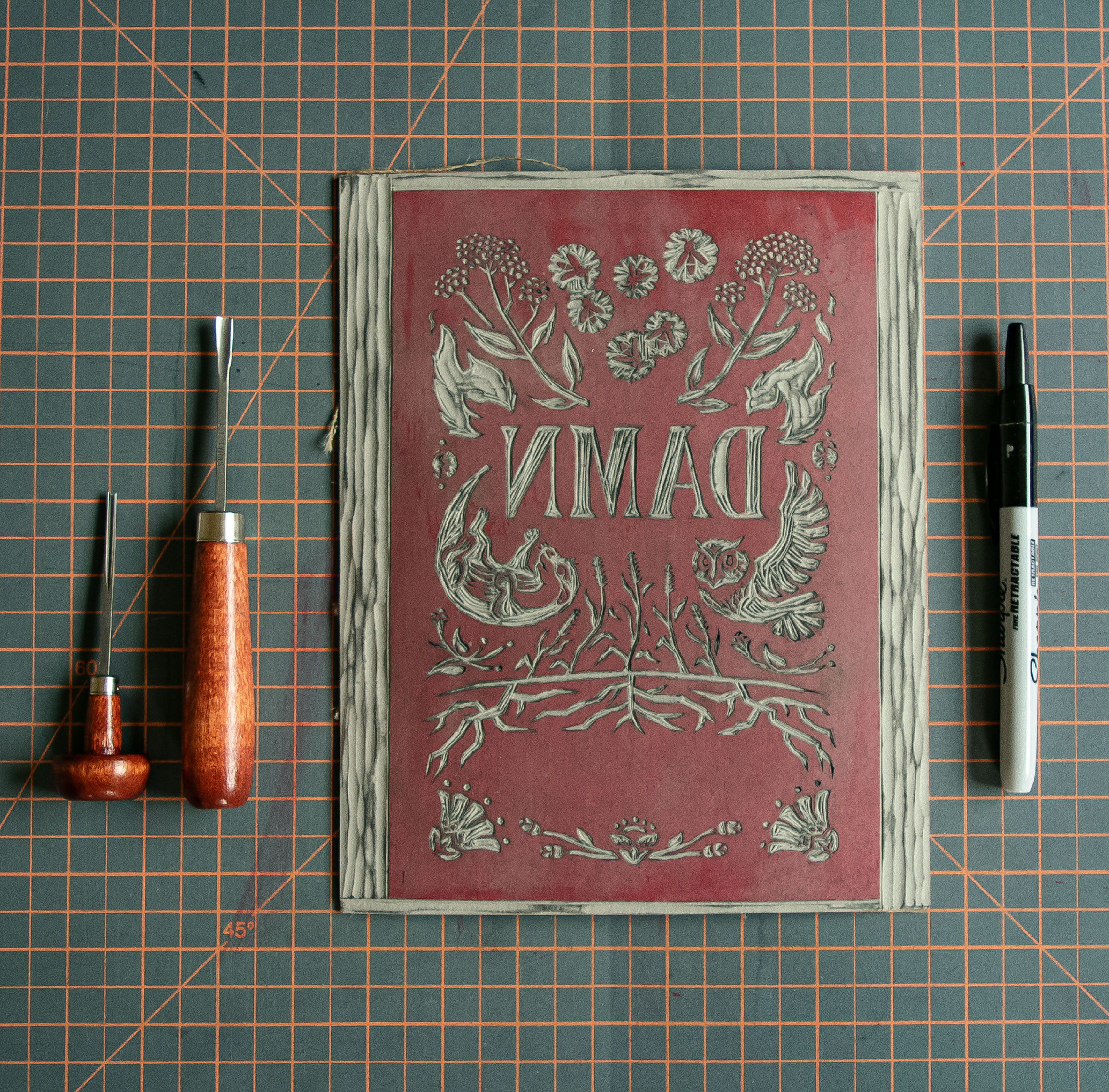 The Damn Rules cover artwork linoleum block for relief printing